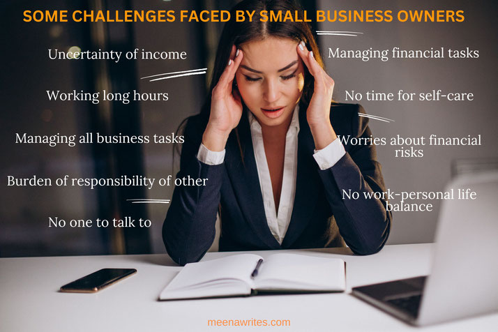 business woman sitting at a desk with fingers on her temple and loking stressed